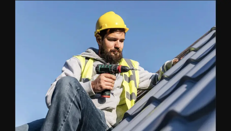 Licensed shingle repair technician on Benton roof - NELA Roofing